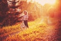 Child girl riding bicycle on summer country road Royalty Free Stock Photo