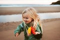 Child girl running on the beach outdoor family lifestyle vacations 4 years old kid happy smiling Royalty Free Stock Photo