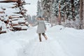 Child girl running on the walk in winter forest Royalty Free Stock Photo