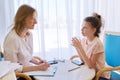 Child girl at session with social worker, school psychologist in office Royalty Free Stock Photo