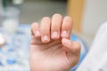 Child show her finger nails after cutting Royalty Free Stock Photo