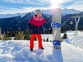 Child Girl With Snowboard In Snow