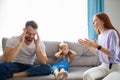 Child girl is suffering from quarrels between parents in the family at home Royalty Free Stock Photo