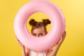 child girl in swimwear with inflatable rubber ring Royalty Free Stock Photo