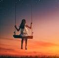 Child girl on swing Royalty Free Stock Photo