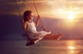 Child girl on swing Royalty Free Stock Photo