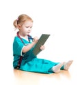 Child girl uniformed as doctor writing to clipboard isolated on