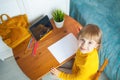 Child girl using tablet and drawing at home Royalty Free Stock Photo