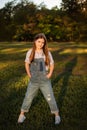 child girl walking outside in nature - freedom and relaxing concept in spring or summer. vertical photo Royalty Free Stock Photo