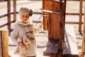 Child girl with wooden bird houses on country side Royalty Free Stock Photo