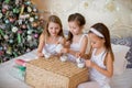 Child girls wake up in her bed in Christmas morning Royalty Free Stock Photo