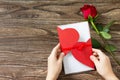 The child gives Mother`s Day or Valentine`s Day gift