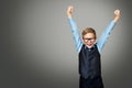 Child in Glasses Raising Up Arms, Happy Kid Boy in Eyeglasses Royalty Free Stock Photo