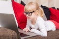 Child with glasses using computer Royalty Free Stock Photo