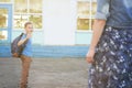 The child goes to school. boy schoolboy goes to school in the morning. happy child with a briefcase on his back and textbooks in Royalty Free Stock Photo