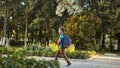 The child goes to school. boy schoolboy goes to school in the morning. happy child with a briefcase on his back and textbooks in Royalty Free Stock Photo