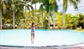 Child with goggles in swimming pool. Kids swim Royalty Free Stock Photo