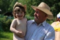 Child and grandfather in cowboy hats Royalty Free Stock Photo