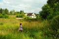 Child in green field