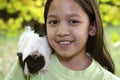 Child with guinea pigs