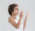 Child with Hajj pilgrimage clothes praying Royalty Free Stock Photo