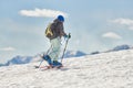 Child halls with mountaineering skis and seal skins