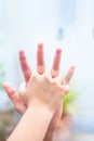 Female childÃ¢â¬â¢s hand holding the hand of elder male shot with bokeh background and horizontal. Concept of fatherÃ¢â¬â¢s day