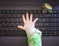 Child hand and computer Royalty Free Stock Photo