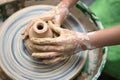 Child hand do ceramics