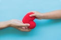 Child hand giving red heart to her dad, Happy family Royalty Free Stock Photo