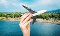 Child hand holding model airplane. Royalty Free Stock Photo