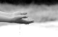 child hand holding water