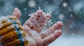A child hand reaching out to catch a falling snowflake, symbolizing the magic of winter Royalty Free Stock Photo