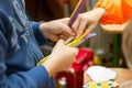 Child handing out stacks. Royalty Free Stock Photo