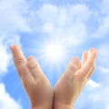 Child hands against sun. Royalty Free Stock Photo