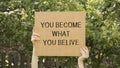 Child hands holding black board with All lives matter letters text, social activists quote for human right protest in USA Royalty Free Stock Photo