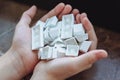 Child hands holding keycaps of white mechanical keyboard