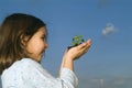 Child hands holding plant Royalty Free Stock Photo