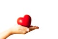 Child hands holding red heart, health care, donate and family insurance concept Royalty Free Stock Photo