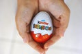 Child hands with Kinder Surprise egg Royalty Free Stock Photo