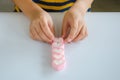 Child hands play jellys on white table Royalty Free Stock Photo
