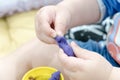 Child hands playing with colorful clay, plasticine in children`s room, Creative playing with baby play dough, hands Royalty Free Stock Photo