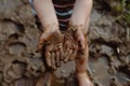 Child Hands Playing with Mud, Strengthening the Immune System, Good Dirt, Hands Cling to Mud