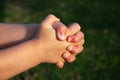 Child hands praying Royalty Free Stock Photo