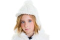 Child happy blond kid girl portrait winter wool white cap Royalty Free Stock Photo