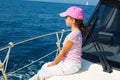 Child happy girl sailing happy boat with cap Royalty Free Stock Photo