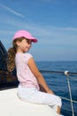 Child happy girl sailing happy boat with cap Royalty Free Stock Photo