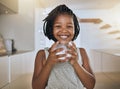 Child, happy and healthy milk drink for energy vitamins or health wellness at home. Black girl portrait, glass and