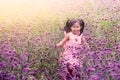 Child happy little girl running and having fun in field Royalty Free Stock Photo