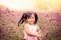 Child happy little girl running and having fun in the field Royalty Free Stock Photo